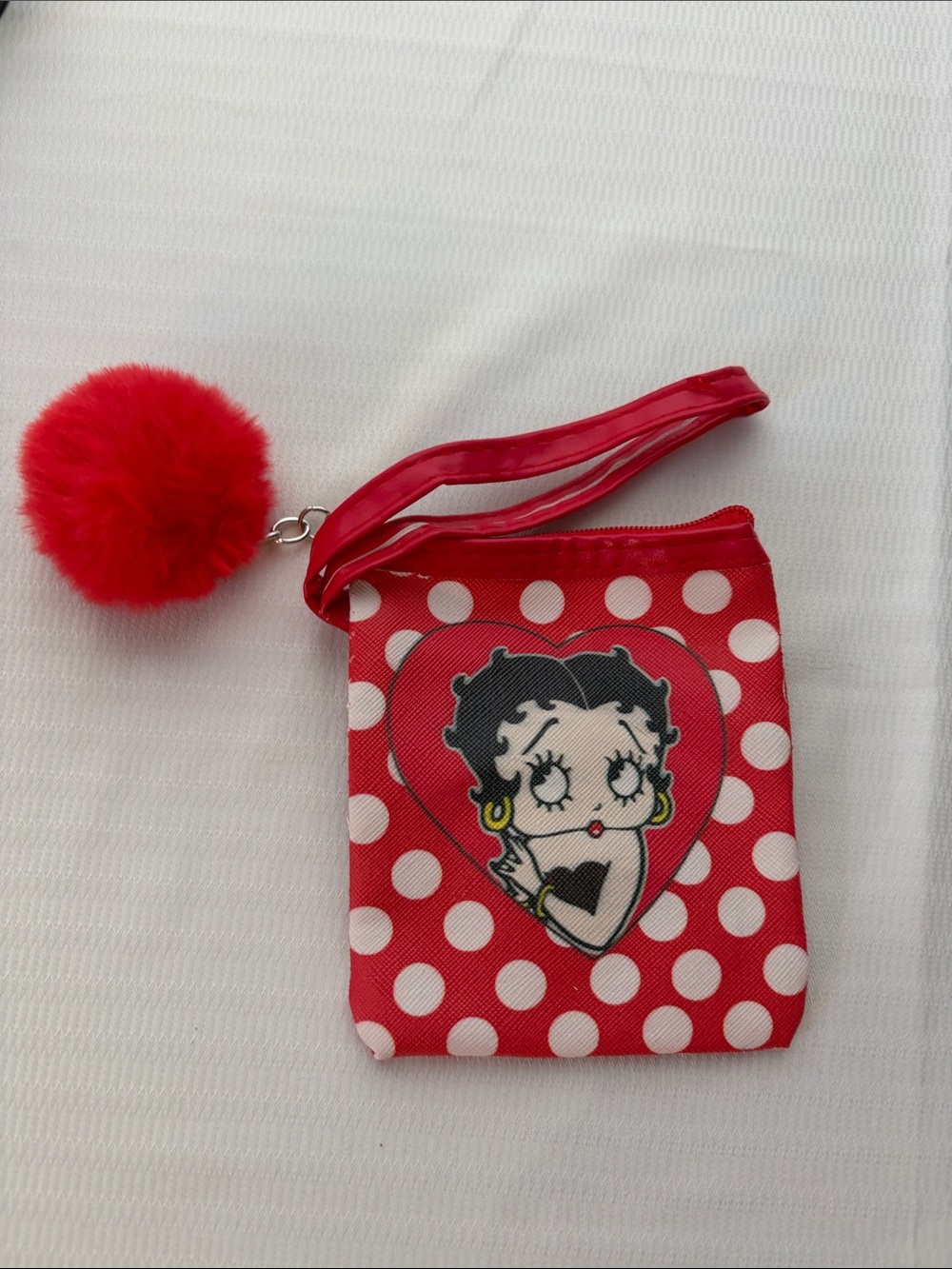 Pick (1) Betty Boop Mini Wristlets with matching pompom
3 1/2” x 4 1/2” - Picture 4 of 5